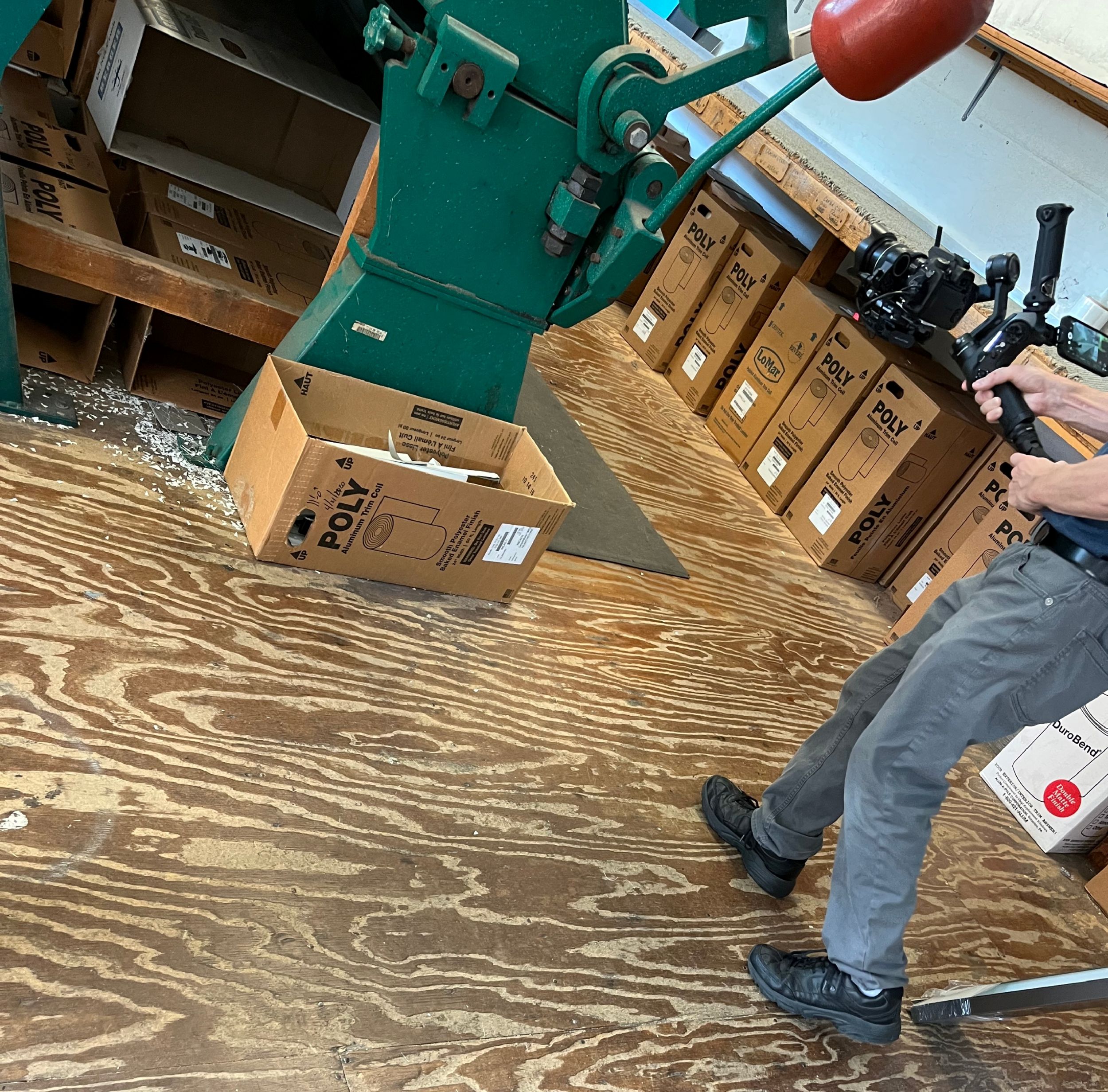 Video production filming inside a cabinet making company in State College PA